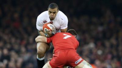 Luther Burrell is tackled by Sam Warburton