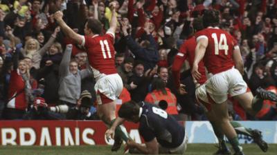 Wales wing Shane Williams celebrates scoring a try against Scotland in their 2010 Six Nations clash in Cardiff.