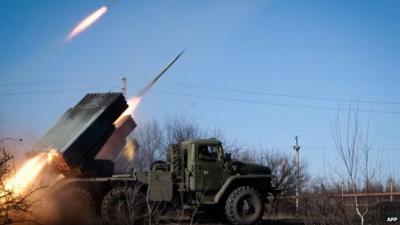 Pro-Russian rebels in the Donetsk region launch missiles from a Grad launch vehicle - 13 February 2015