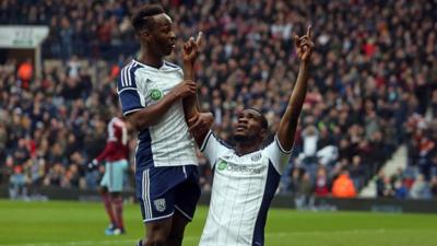 Brown Ideye and Saido Berahino celebrating.