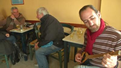 Greek people in a cafe