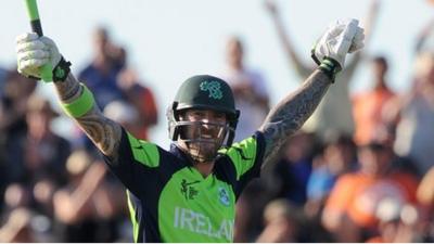 John Mooney celebrates his winning hit