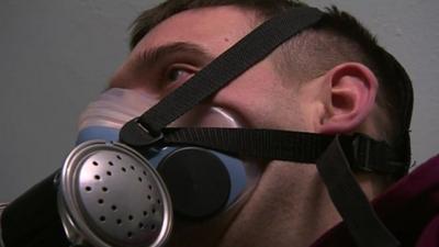 Ben Parkinson wearing an oxygen mask during new medical treatment