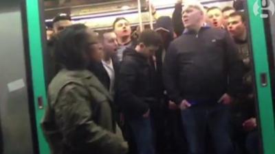 Image of men on a Metro train