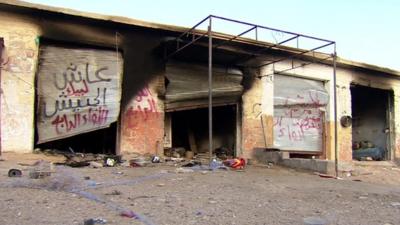 Empty shops in Mansouriya north of Baghdad