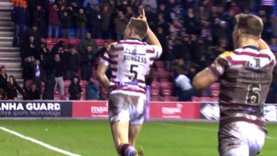 Joe Burgess celebrates scoring for Wigan Warriors