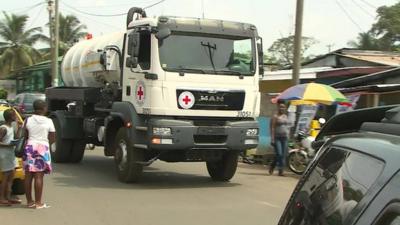 Practice run of a Red Cross truck which will be carrying Ebola-infected human waste