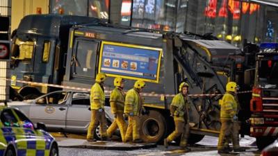 The crashed bin lorry