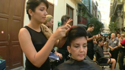 Cuban Americans send money to relatives to pay for businesses such as hairdressing
