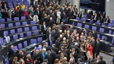 Members of the German parliament vote on financial help for Greece