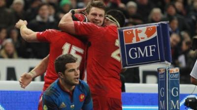 Wales's Dan Biggar celebrates his try