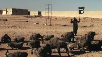 Islamic State members training