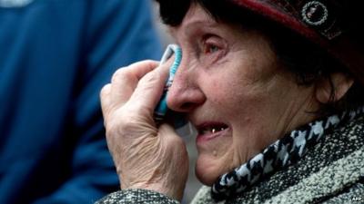 Valentina Dzuba, 72, mother of a miner, cries outside the Zasyadko mine in Donetsk