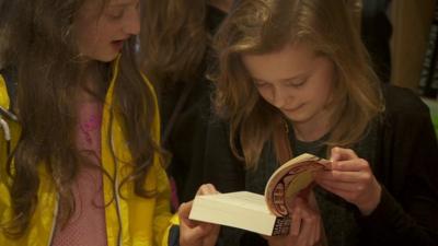 A girl reading a book