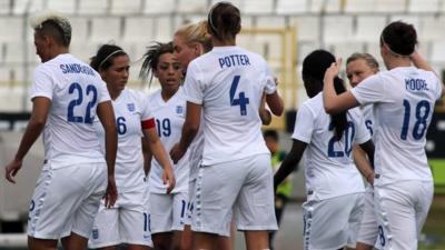 England women celebrate their 3-1 victory over Finland