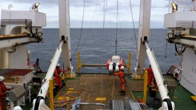 The deck of the ship searching for the plane