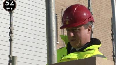 David Cameron on building site