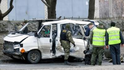 Wreckage of a minibus in Kharkiv