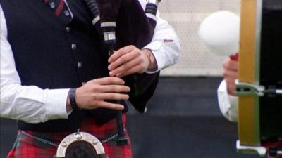 Man playing bagpipes