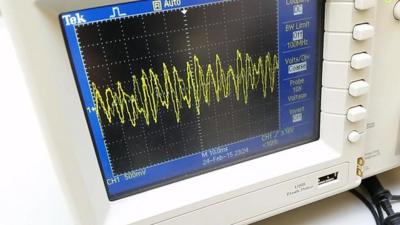 Sound waves displayed on an oscilloscope
