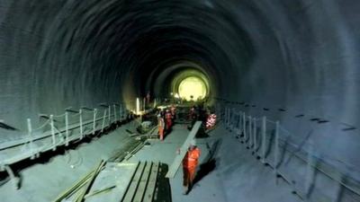 Workers in a Crossrail tunnel
