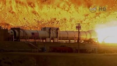 Nasa rocket booster during test-firing in Utah desert