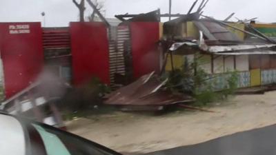 Footage shows damaged buildings in Port Vila