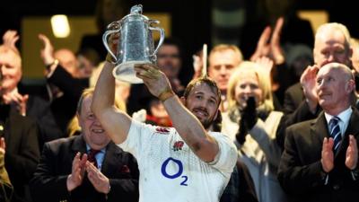 England captain Chris Robshaw lifts the Calcutta Cup.