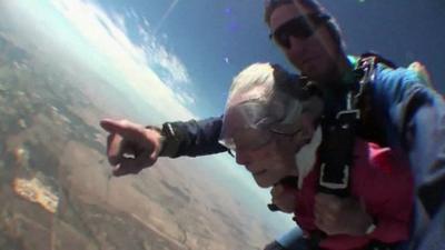 Georgina Harwood and her instructor mid skydive