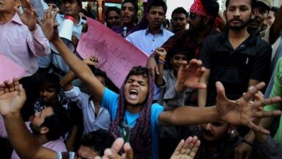 Pakistani Christians chant slogans during demonstration to condemn the suicide bombing attack on two churches, Sunday, March 15, 2015