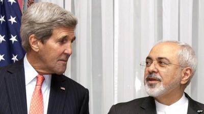 US Secretary of State John Kerry (L) and his Iranian counterpart Mohammad Javad Zarif pose before resuming talks over Iran's nuclear programme in Lausanne