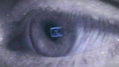 An eye looking at a computer