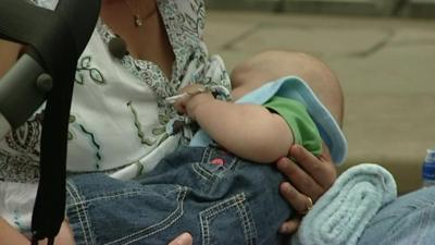 A baby being breastfed