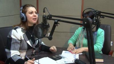 Radio presenters at a Christian radio station