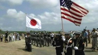 American and Japanese flags held aloft at ceremony to mark 70th anniversary of the battle of Iwo Jima