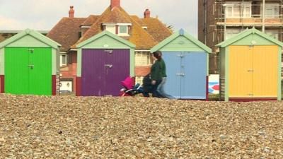 People walking on seafront in Hove