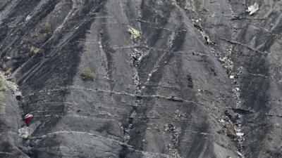 Mountainside strewn with debris