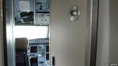 File photo showing opened door into Airbus plane cockpit