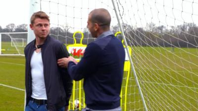 Wales striker Simon Church and Israel defender Tal Ben Haim