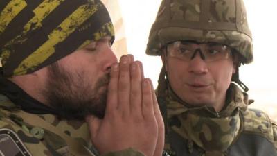 Two Ukrainian volunteers