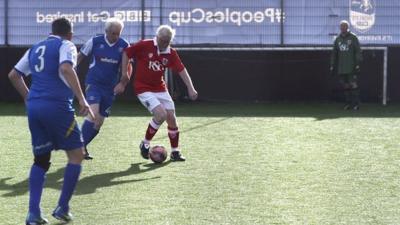 Veterans playing football