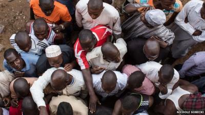 Aerial view of Nigerian voters waiting at a polling station in Abuja