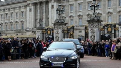 David Cameron's motorcade leaving Buckingham Palace