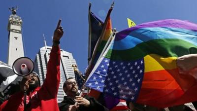 Demonstrators gather to protest a controversial religious freedom bill in Indianapolis