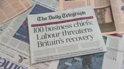 The front page of the Daily Telegraph bearing the headline '100 business chiefs: Labour threatens Britain's recovery'