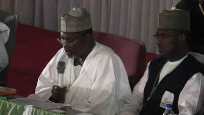 Inec chairman Attahiru Jega (left)