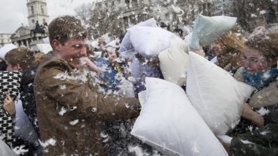 Participants take part in International Pillow Fight Day in Trafalgar Square in London April 4, 2015.