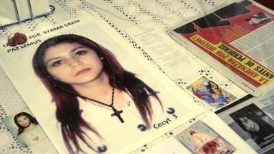 Picture of missing girl on table