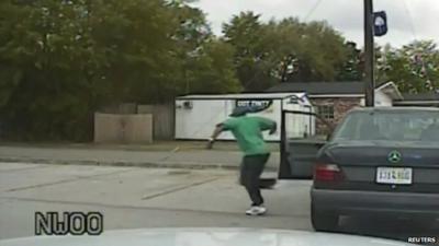 Still from police dash cam video showing shooting victim Walter Scott running from his car