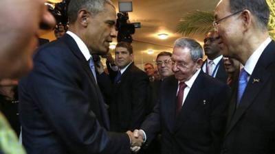 President Obama and Raul Castro shaking hands